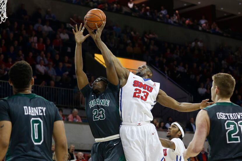 Feb 28, 2016; Dallas, TX, USA;  Tulane Green Wave forward Blake Paul (23) fights for a...