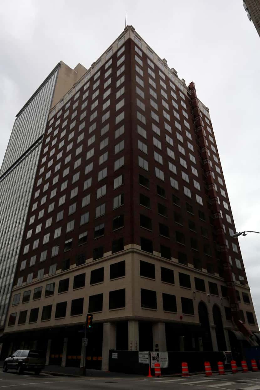 
The 1700 Commerce Street office building will be converted to a 176-room Hampton Inn hotel....