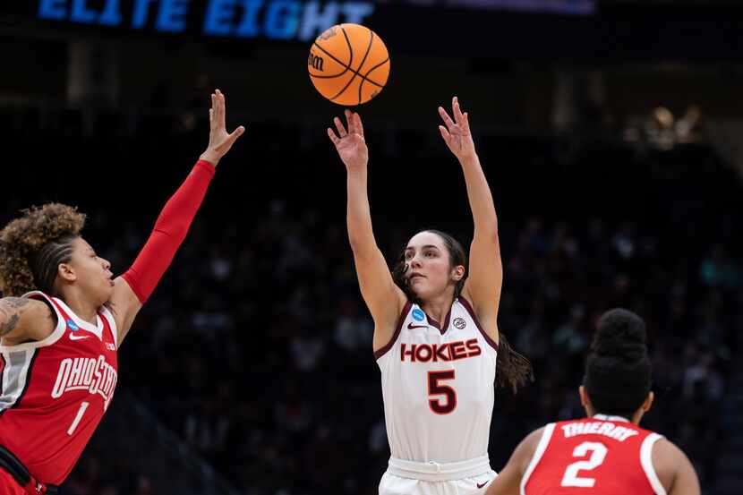 Virginia Tech guard Georgia Amoore (5) shoots over Ohio State guard Rikki Harris during the...