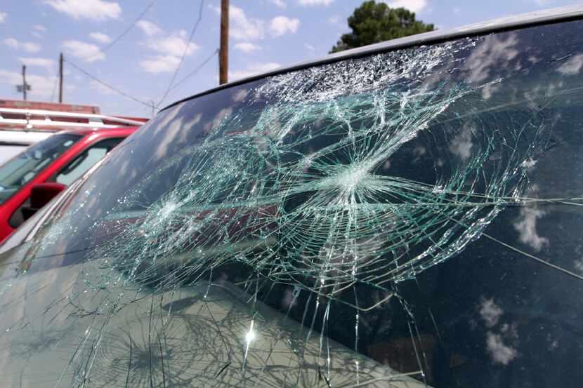 Permian Glass's parking lot is filled with vehicles in need of window replacement from...