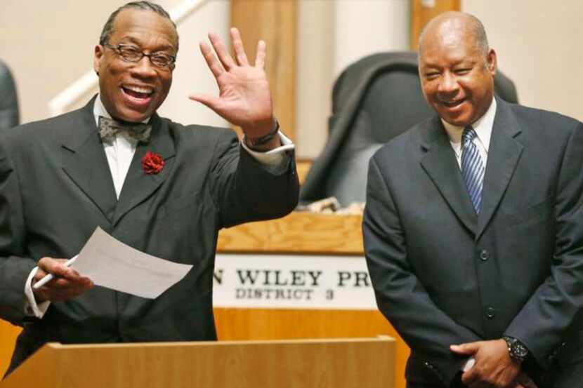 Dallas County Commissioner John Wiley Price (left) prepares to swear in County Auditor...
