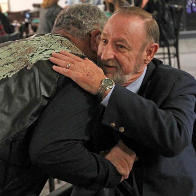 
Reggie Gutierrez (left), hugs Gil Benoit during the VFW Post 4380 casino night fundraiser....