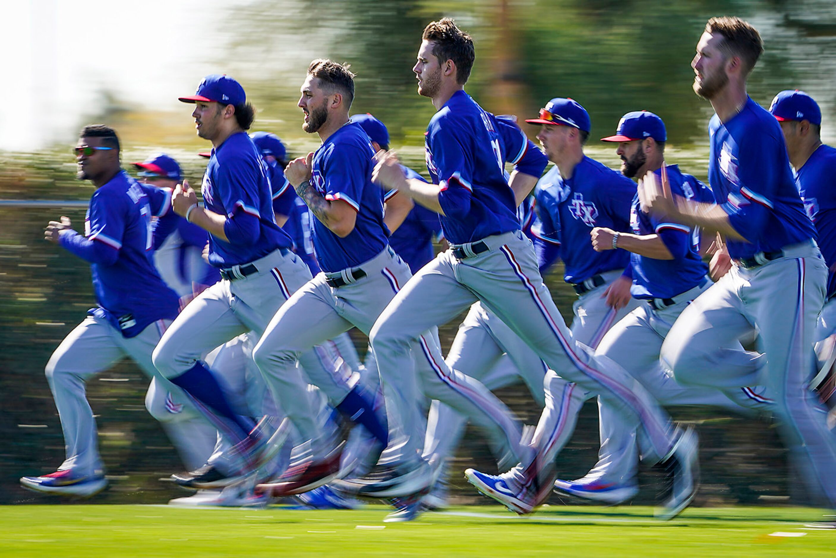 Texas Rangers pitchers, including, from far left, Yohander Mendez, Tyler Phillips, Joe...