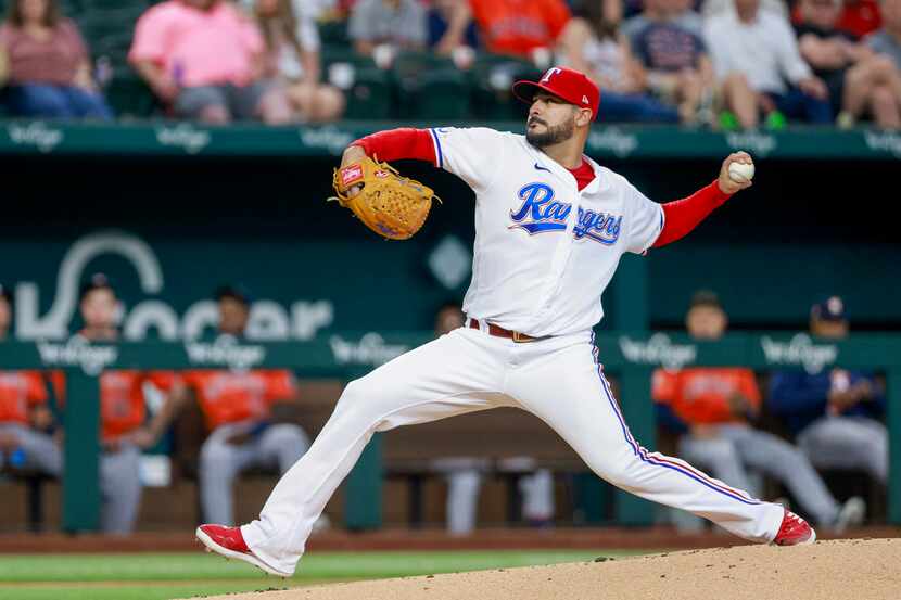 Texas Rangers starting pitcher Martin Perez (54) delivers a pitch during the first inning...