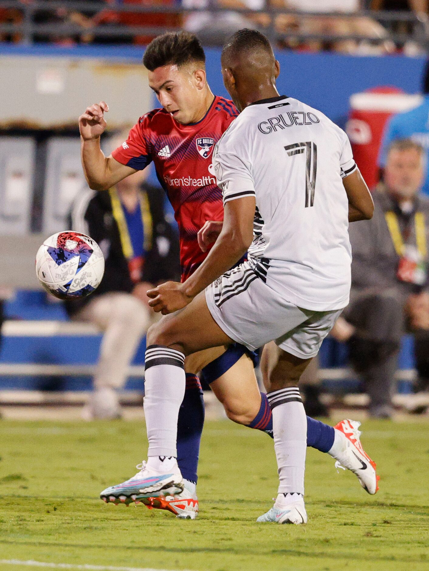 FC Dallas forward Alan Velasco (20) and San Jose Earthquakes midfielder Carlos Gruezo (7)...