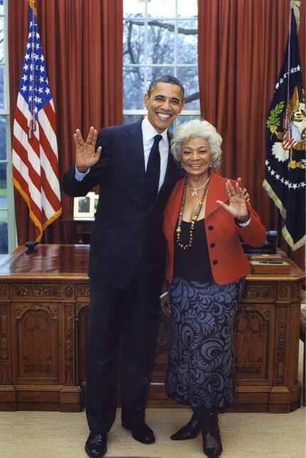 President Barack Obama and Star Trek actress give the Vulcan salute in the Oval Office at...