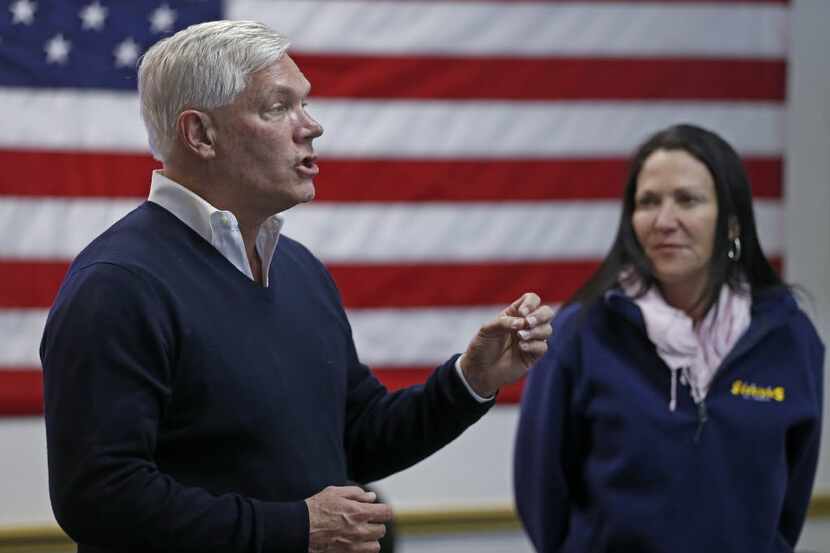 U.S. Rep. Pete Sessions, R-Dallas, left, speaks next to his wife Karen at his campaign...