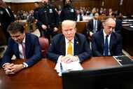 Former President Donald Trump attends his trial at Manhattan Criminal Court in New York on...
