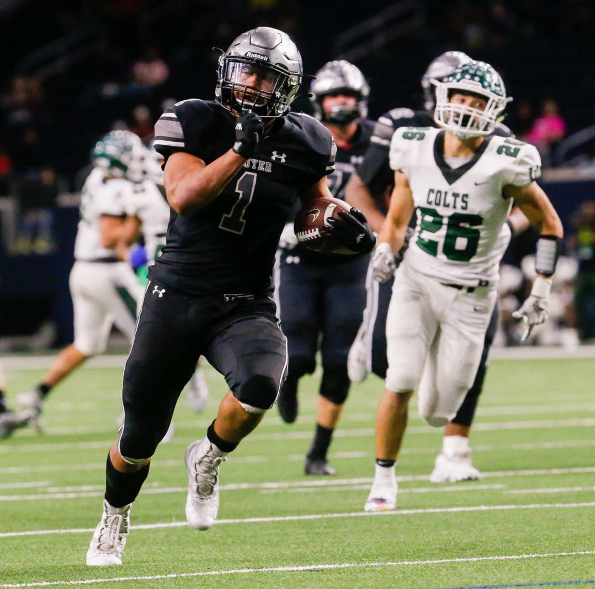 Guyer's Kaedric Cobbs (1) completes a 37 yard run touchdown in the fourth quarter of a Class...