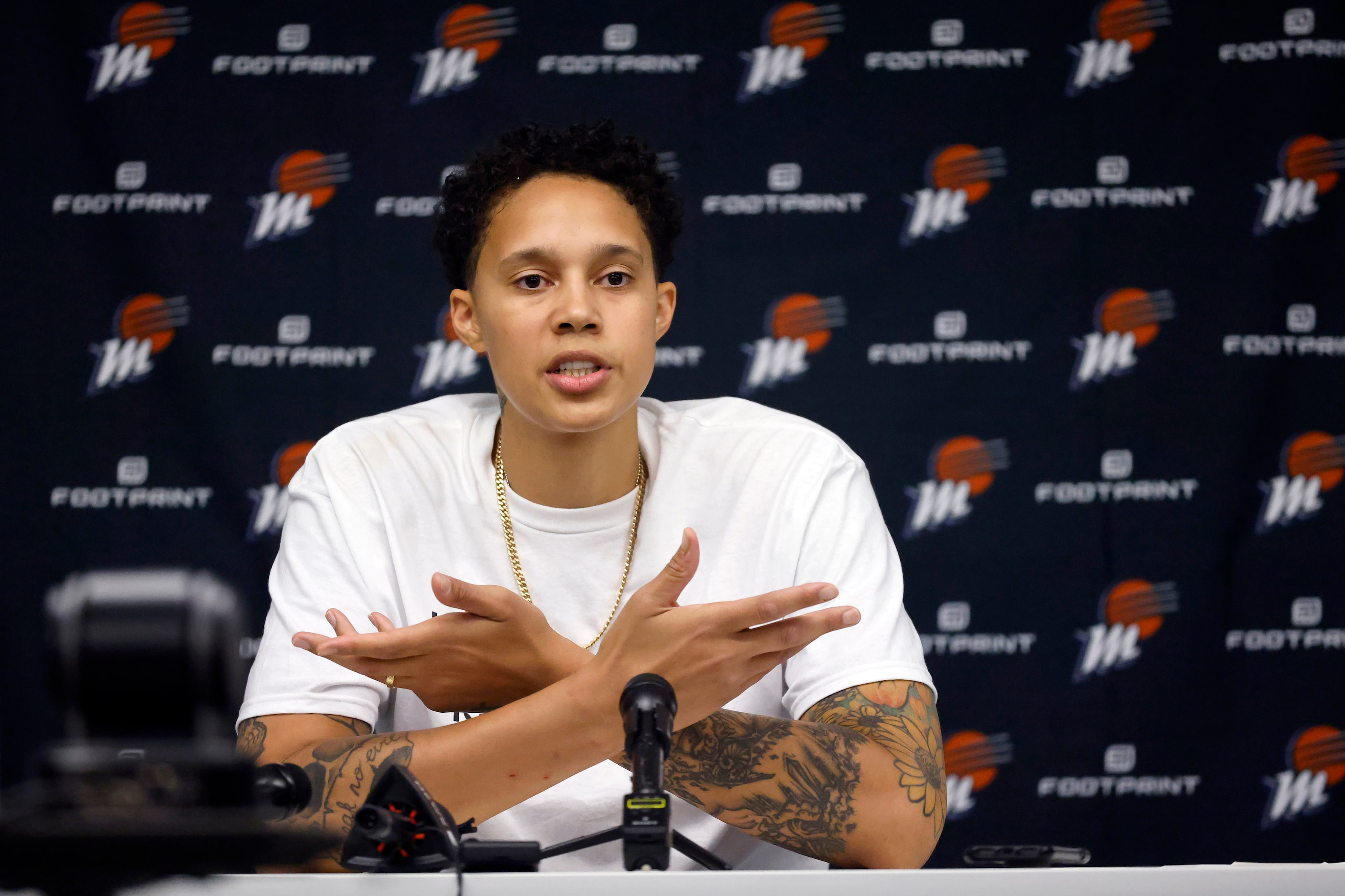 Phoenix Mercury center Brittney Griner (42) answers questions from the media following her...