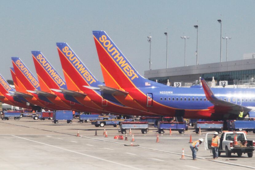  Southwest Airlines planes line up at Dallas Love Field. (Vernon Bryant/The Dallas Morning...