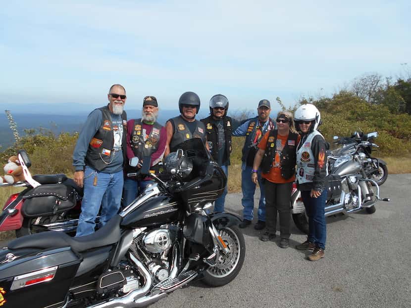 The Highway Disciples drive their motorcycles down the Talimena National Scenic Byway in...