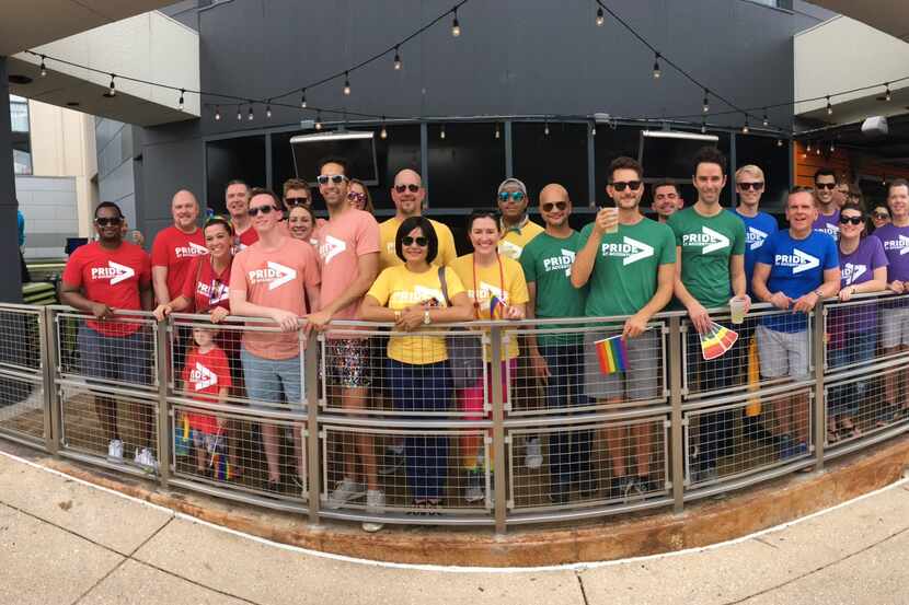 Workers from Accenture gathered to celebrate Pride Week.