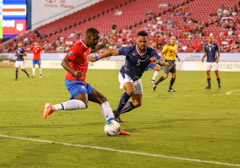 Joel Campbell cuts back against Bermuda defender Jalen Harvey at the 2019 Gold Cup at Toyota...