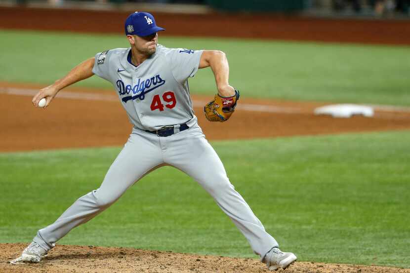 Los Angeles Dodgers relief pitcher Blake Treinen (49) pitches in a game against the Tampa...