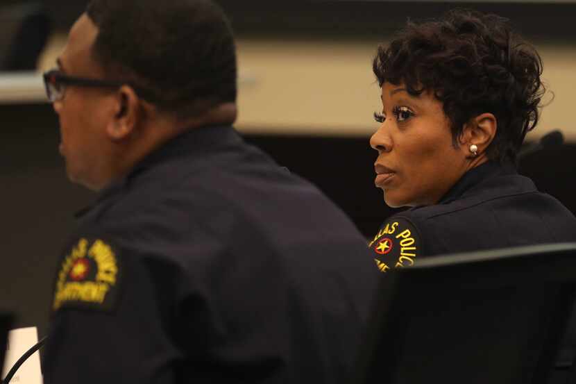 Dallas Police Chief U. Renee Hall looks over to Lt. David Davis as he presents an overview...