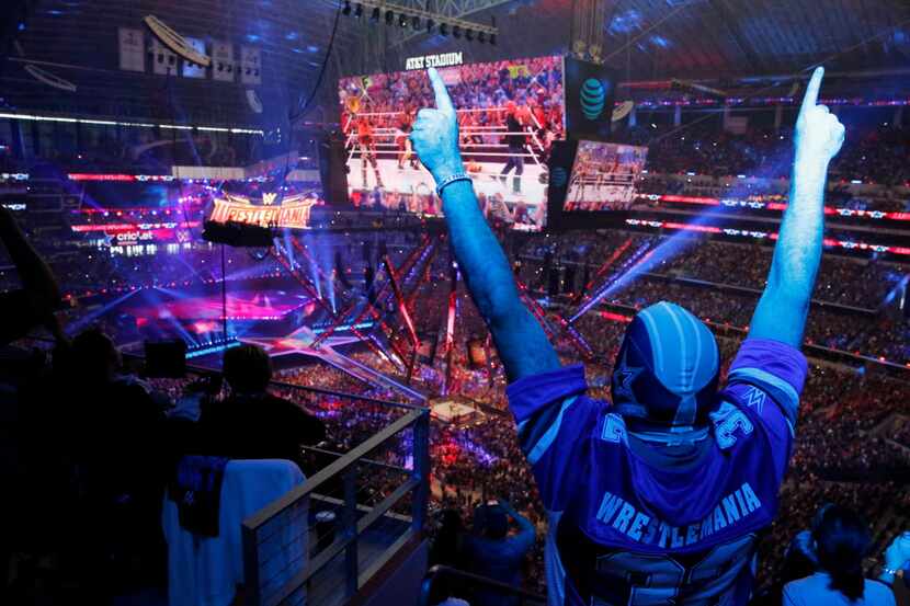 Kevin Bracken of Indiana cheers on "Stone Cold" Steve Austin at WrestleMania 32 at AT&T...