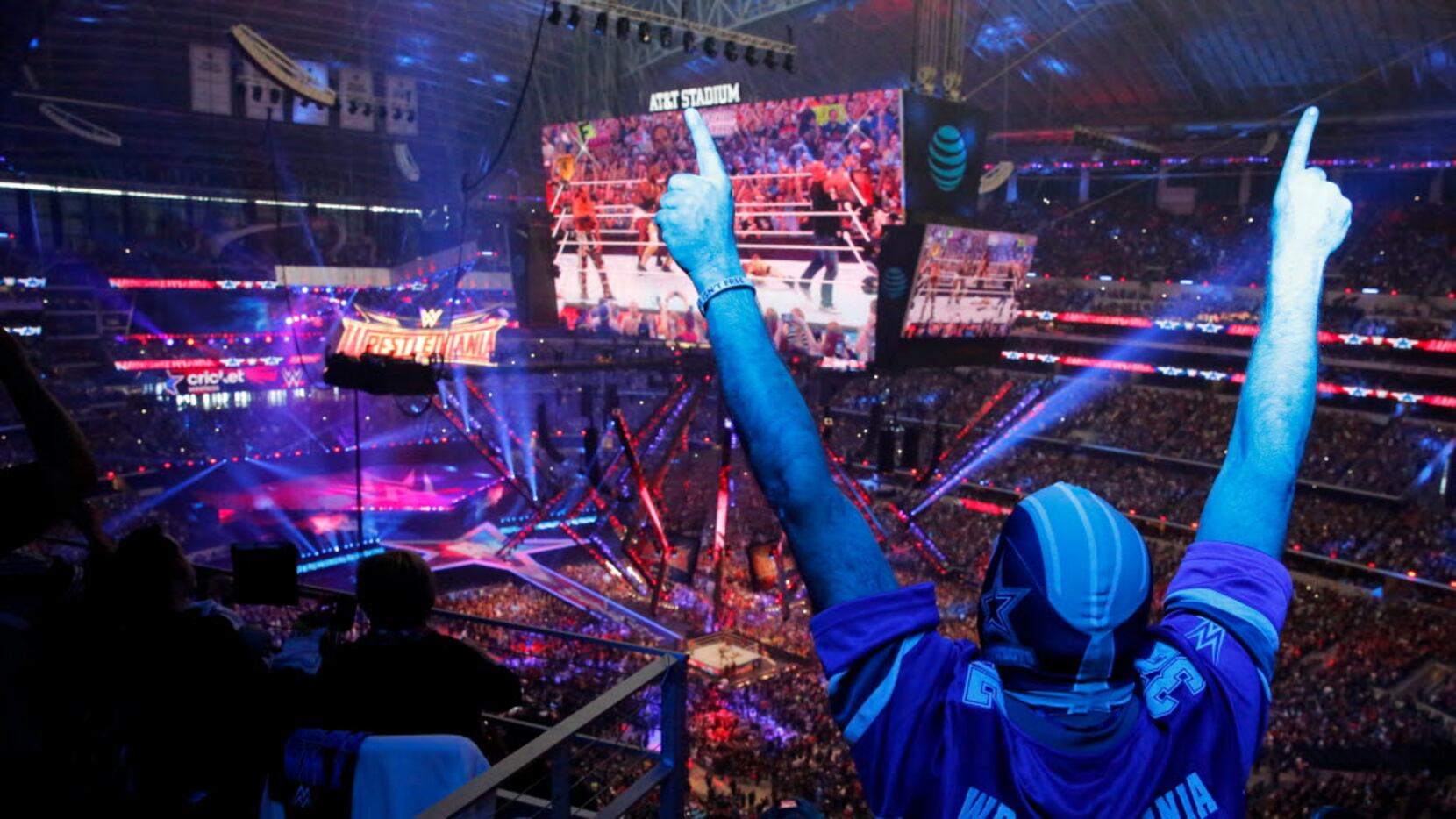 Kevin Bracken of Indiana cheers on "Stone Cold" Steve Austin at WrestleMania 32 at AT&T...