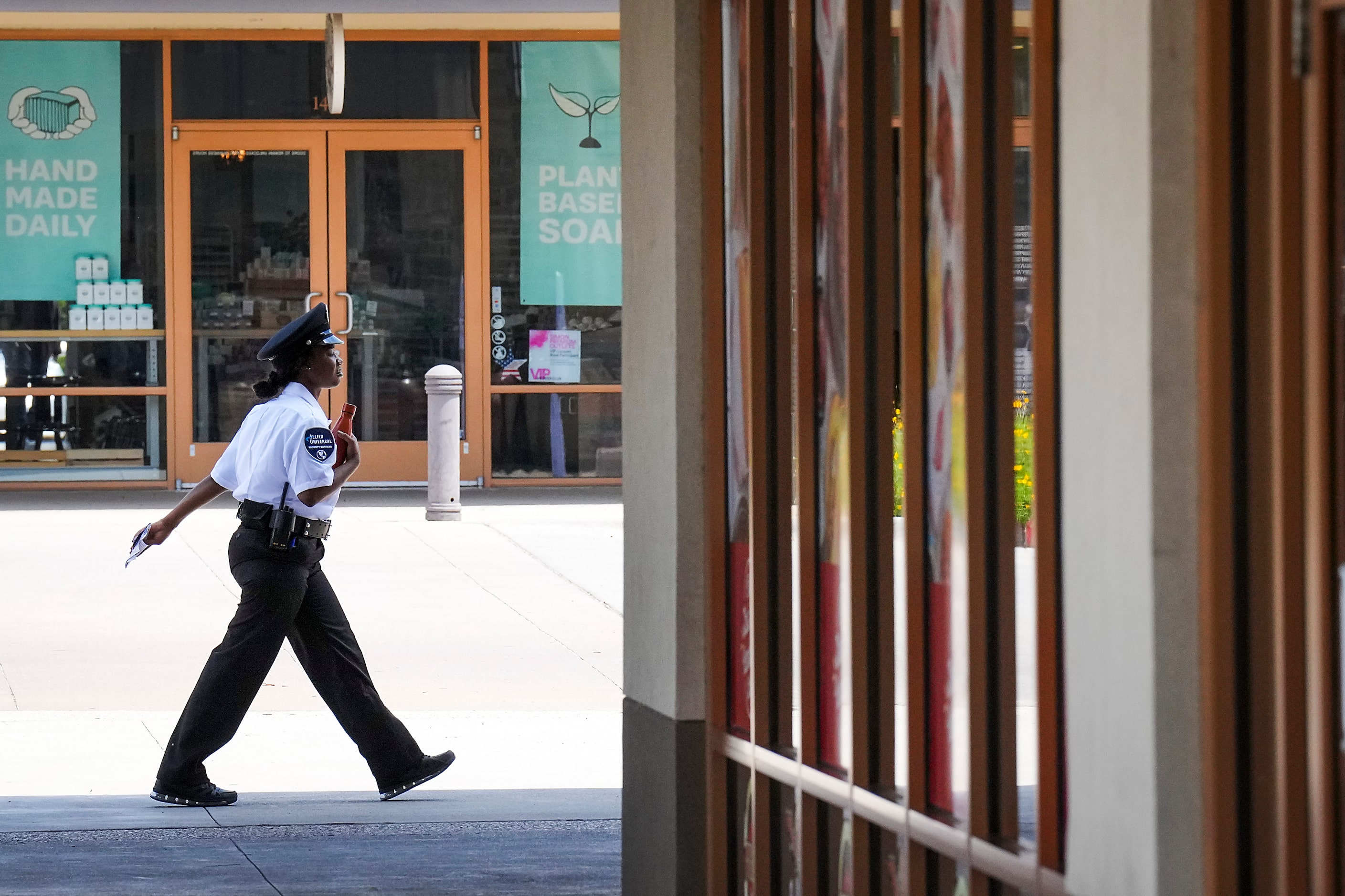 A security guard patrols at the Allen Premium Outlets on Wednesday, May 31, 2023, in Allen....