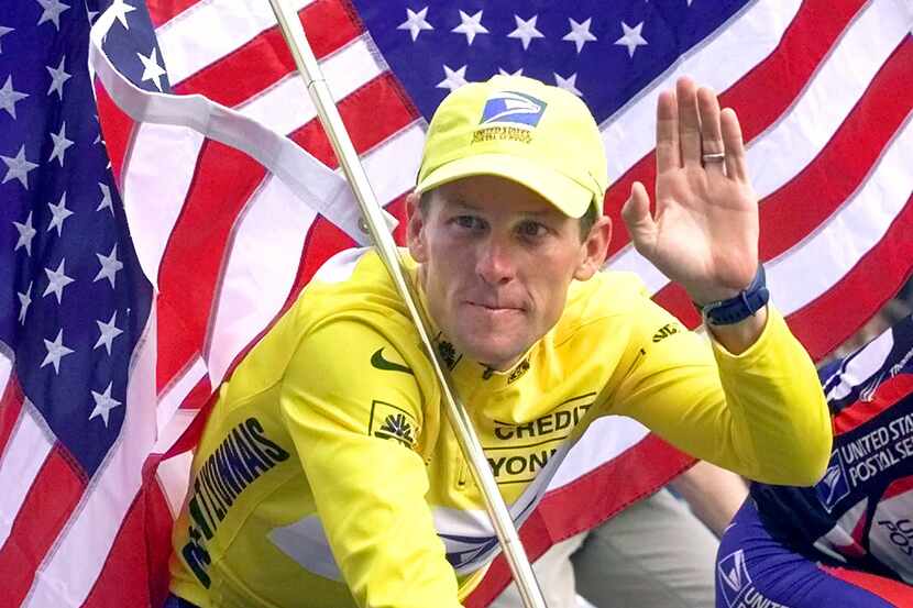 FILE - This July 23, 2000 file photo shows Tour de France winner Lance Armstrong riding down...