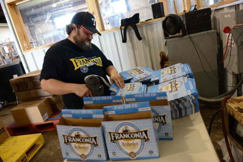 
Matt Clayton prepares packaging on Sept. 4 at Franconia Brewing Company in McKinney. When...