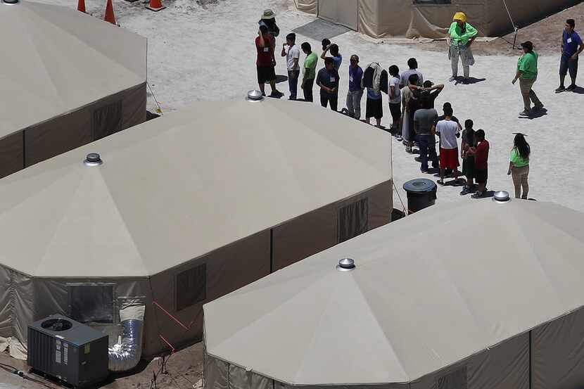 Children and workers at a tent encampment recently built near the Tornillo Port of Entry on...