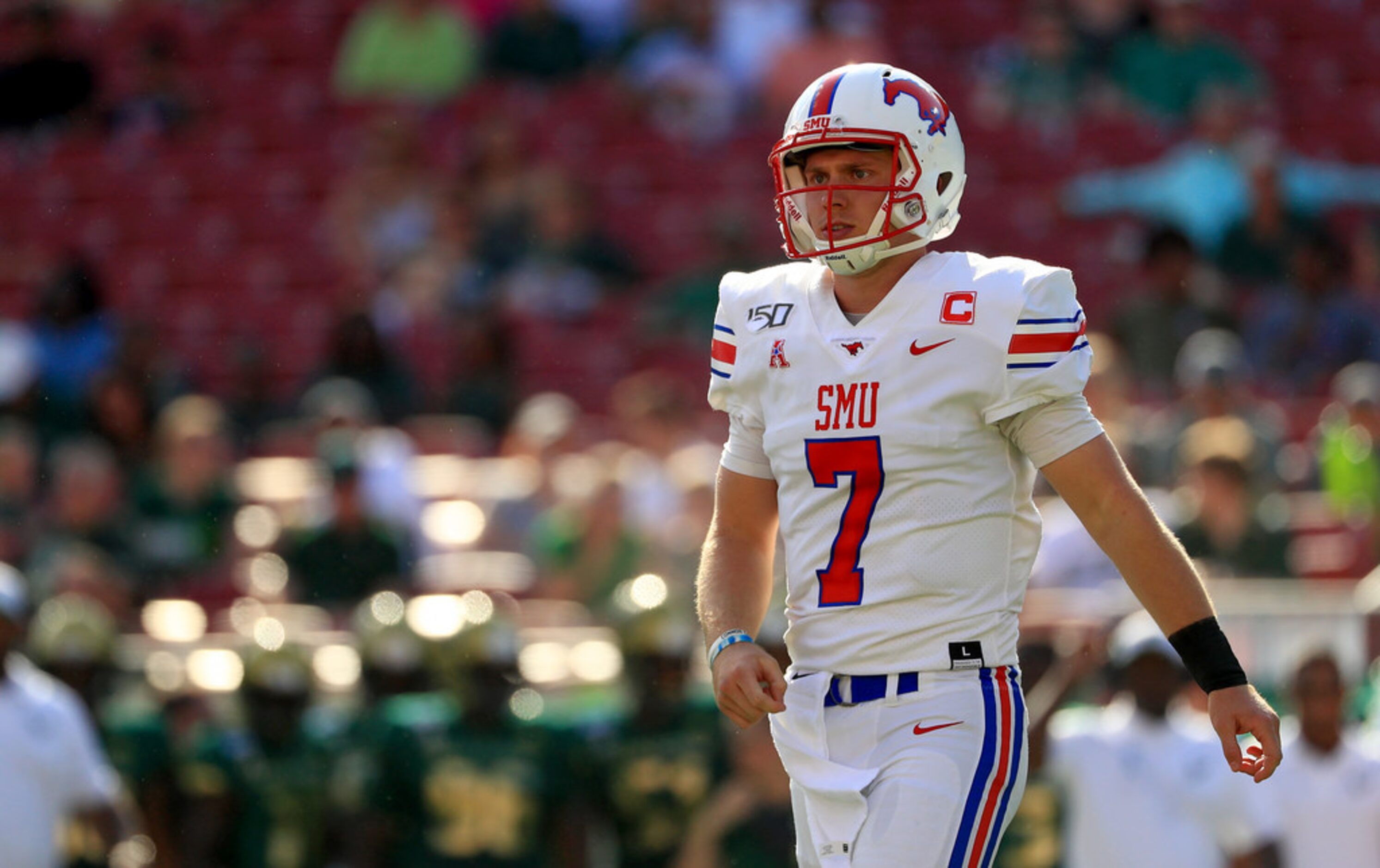 TAMPA, FLORIDA - SEPTEMBER 28: Shane Buechele #7 of the Southern Methodist Mustangs...