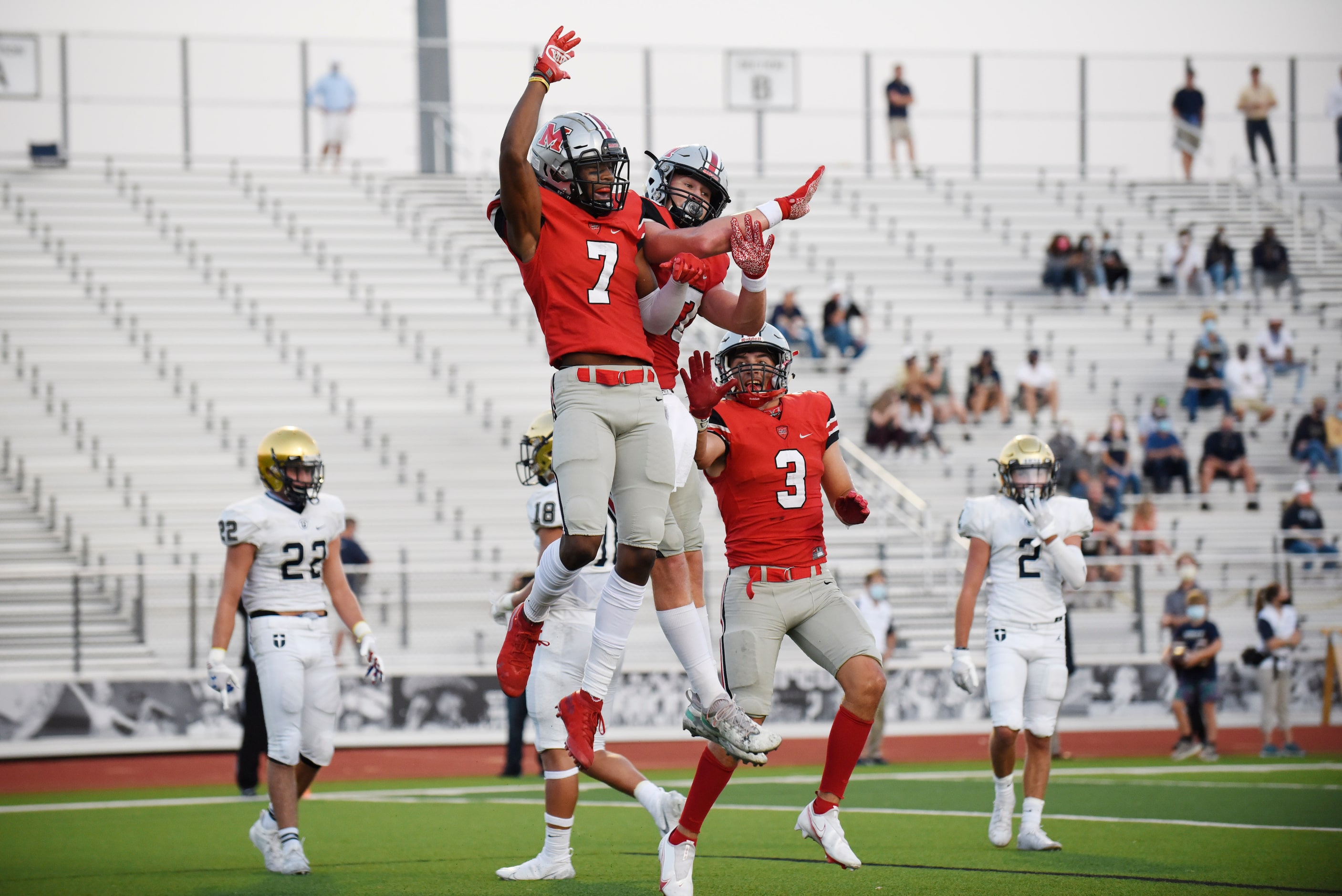 Flower Mound Marcus senior wide receiver J. Michael Sturdivant (7) celebrates with junior...