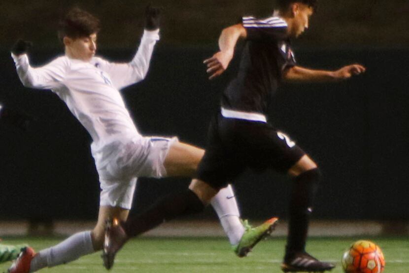 Grand Prairie's Valentin Ruiz (14) stretches out to defend against the ball command of...