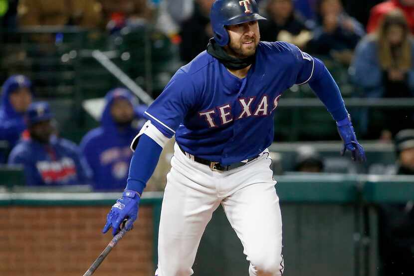 Texas Rangers first baseman Joey Gallo watches his two-run double against Blue Jays during...