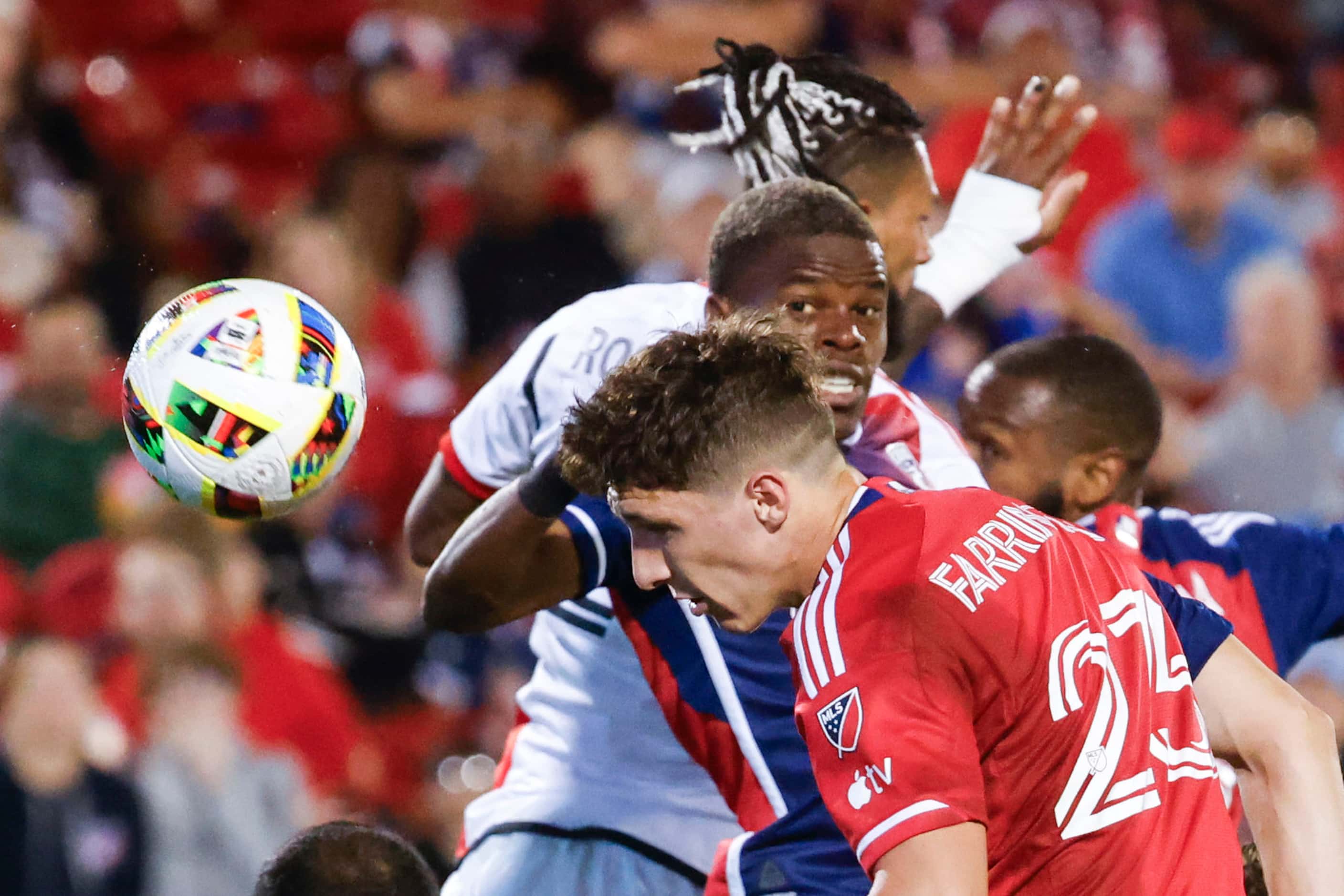 FC Dallas’ Logan Farrington (front) heads the ball during the second half of an MLS soccer...