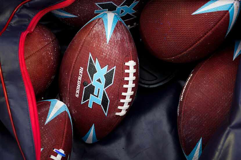 A bag of game balls is seen before an XFL football game between the Dallas Renegades and the...