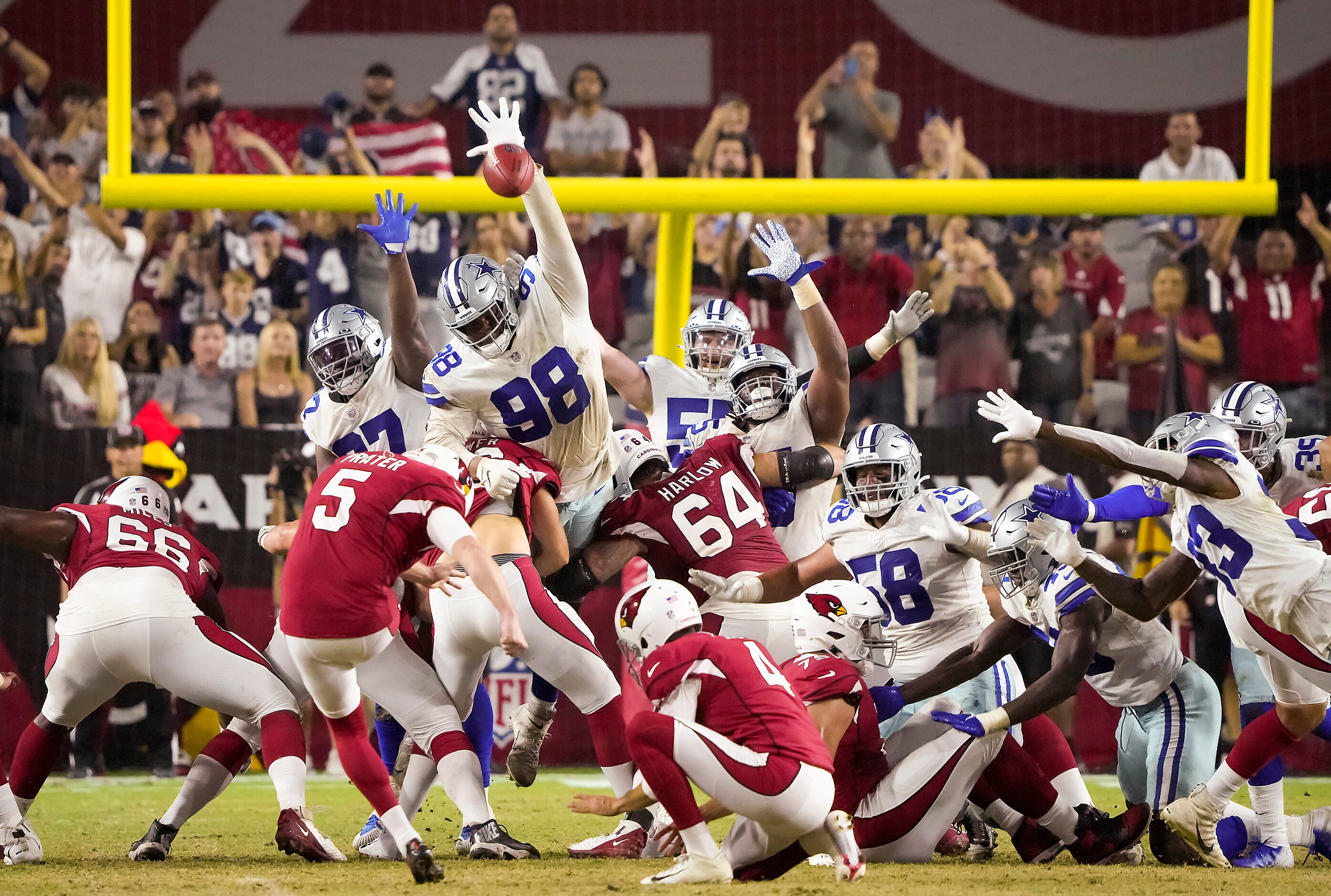 Arizona Cardinals kicker Matt Prater (5) kicks a game-winning 57-yard field goal over Dallas...