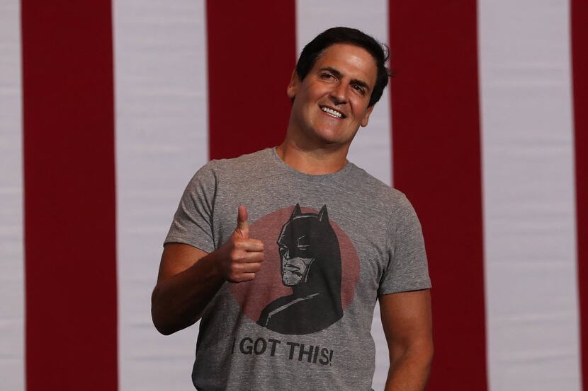 Mark Cuban gives the thumbs-up before the start of a campaign rally with Democratic...