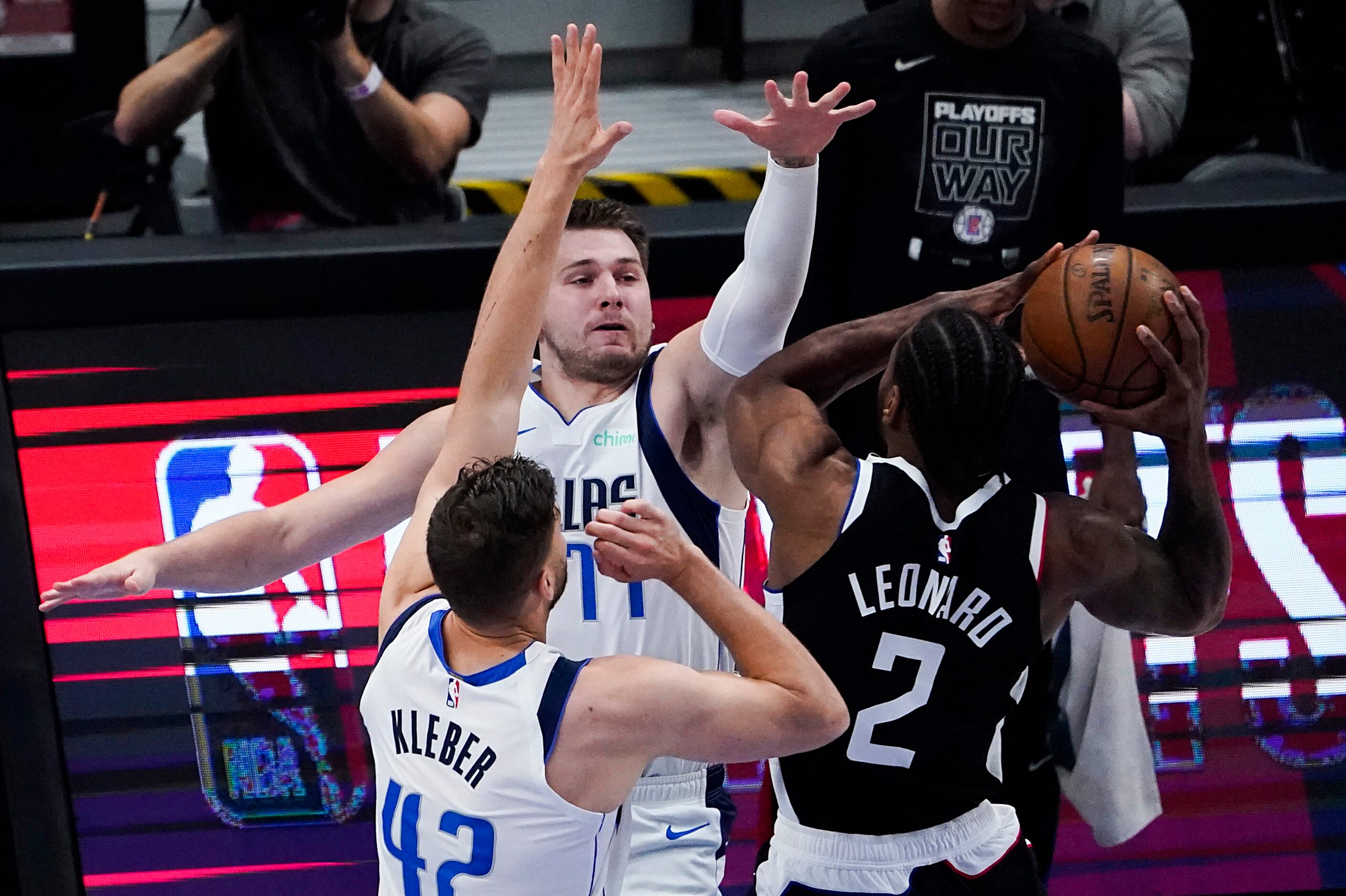 Dallas Mavericks guard Luka Doncic (77) and forward Maxi Kleber (42) defend against LA...