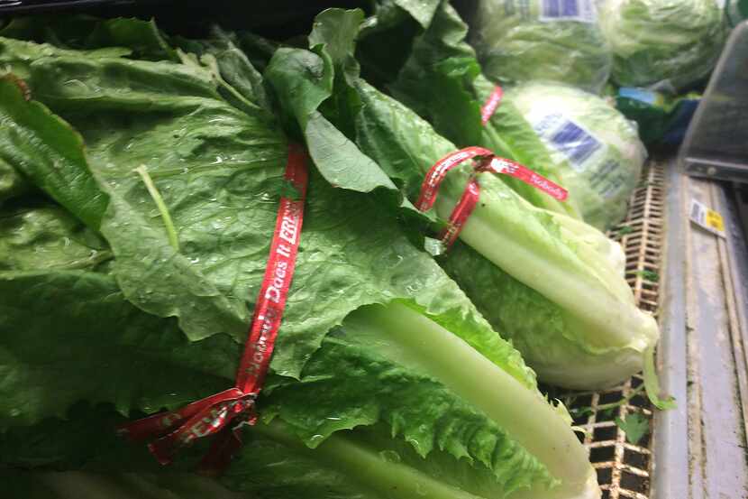Romain lettuce is displayed in the produce section of Tom Thumb at the corner of Meadow Rd...