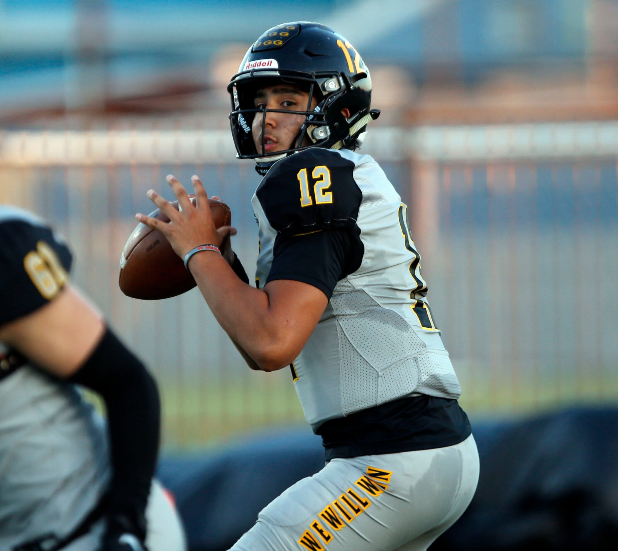 Garland high QB Cergio Perez (12) prepares to throw the football during the first half a...