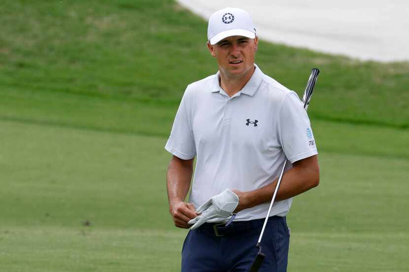 Jordan Spieth walks after chipping onto the sixth green during the second round of the Byron...