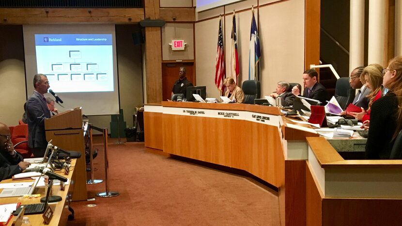 Dr. Esmaeil Porsa, left, a Parkland executive vice president, addressed the Dallas County...