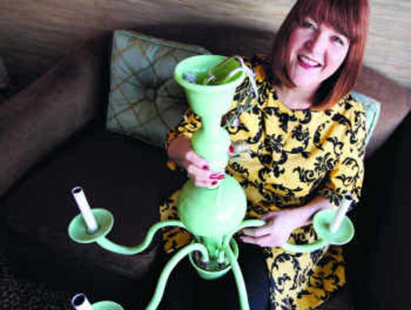  A funky green chandelier ($399) is just one of many unusual decorative items found by Sally...