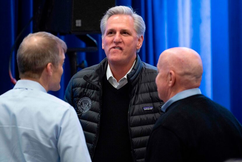 House Minority Leader Kevin McCarthy speaks with Reps. Jim Jordan of Ohio (left) and Kevin...