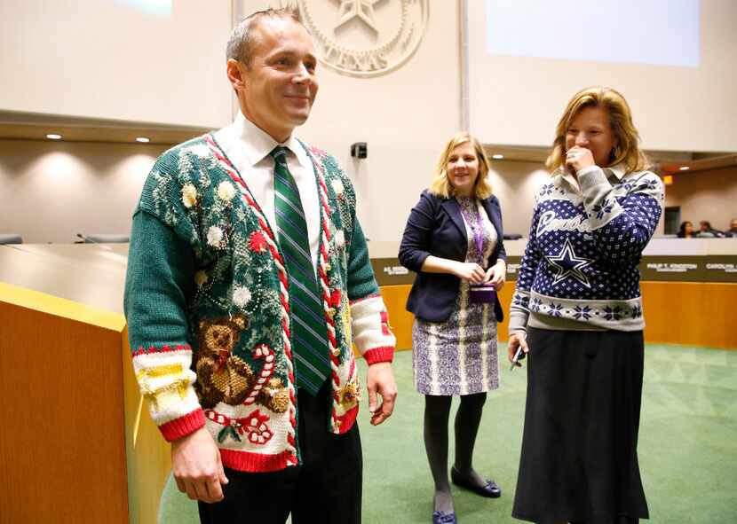 At the final council meeting of 2016, the council members wore Christmas sweaters. Mark...