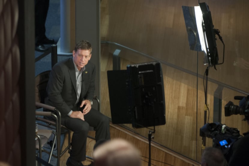 Former Dallas Cowboys quarterback Troy Aikman waits to be interviewed during an event...