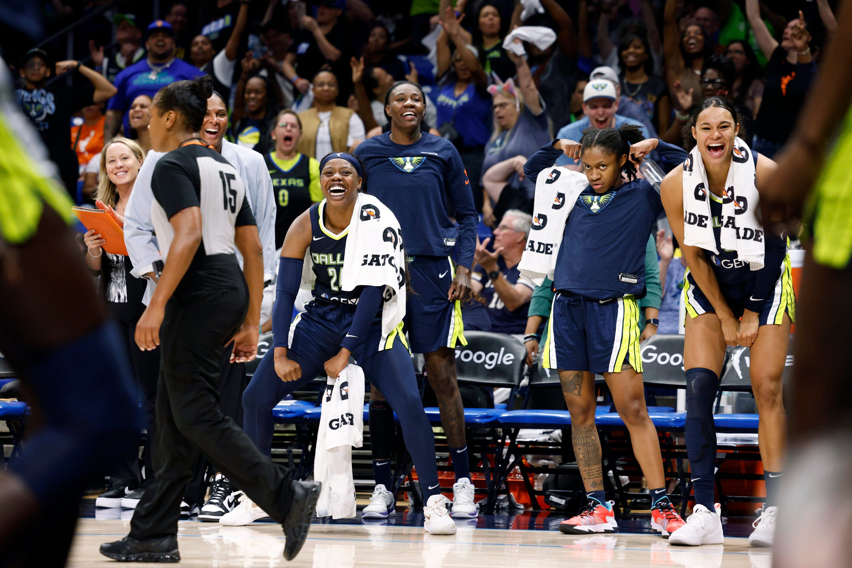 From left, Dallas Wings guard Arike Ogunbowale (24), forward Natasha Howard (6), guard...