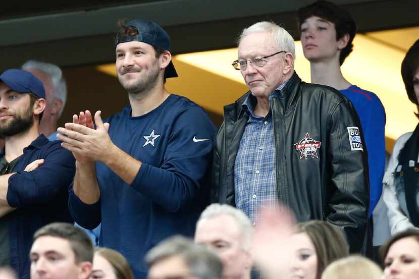 Dallas Cowboys owner Jerry Jones and Tony Romo watch a UIL Class 5A Division I state...