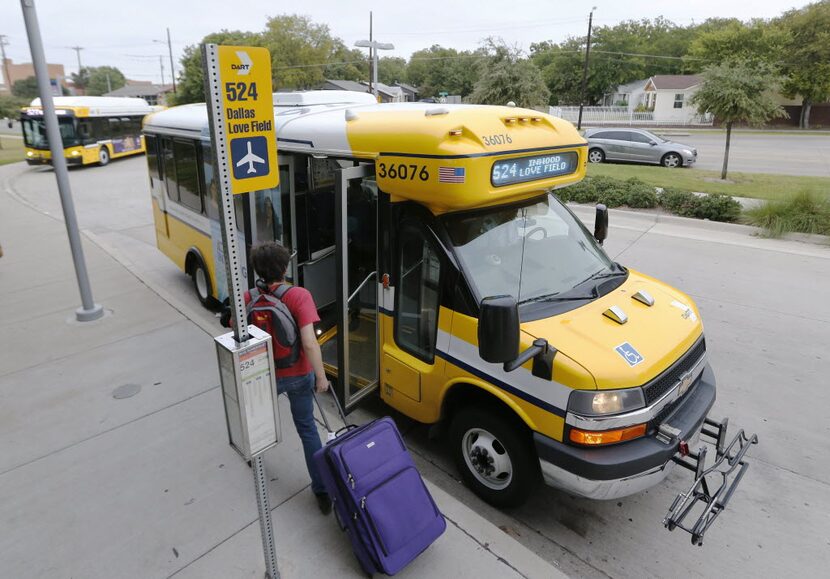 Maurice Chai, 26, from New Zealand takes the DART shuttle bus from the Inwood/Love Field...