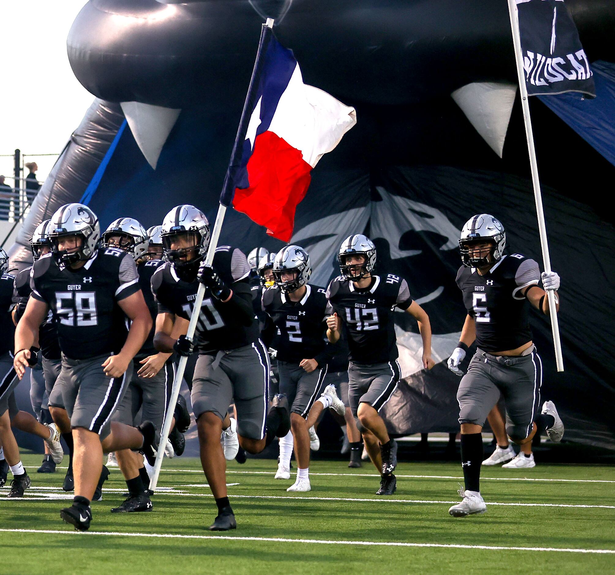 The Denton Guyer Wildcats enter the field to face Allen in a District 5-6A high school...