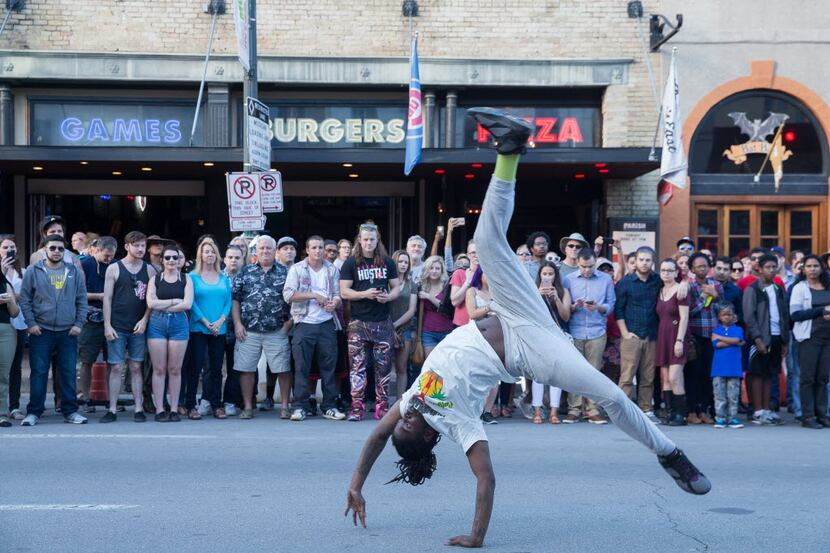 The Calypso Tumblers perform for an audience on 6th Street in Austin at SXSW on Saturday,...