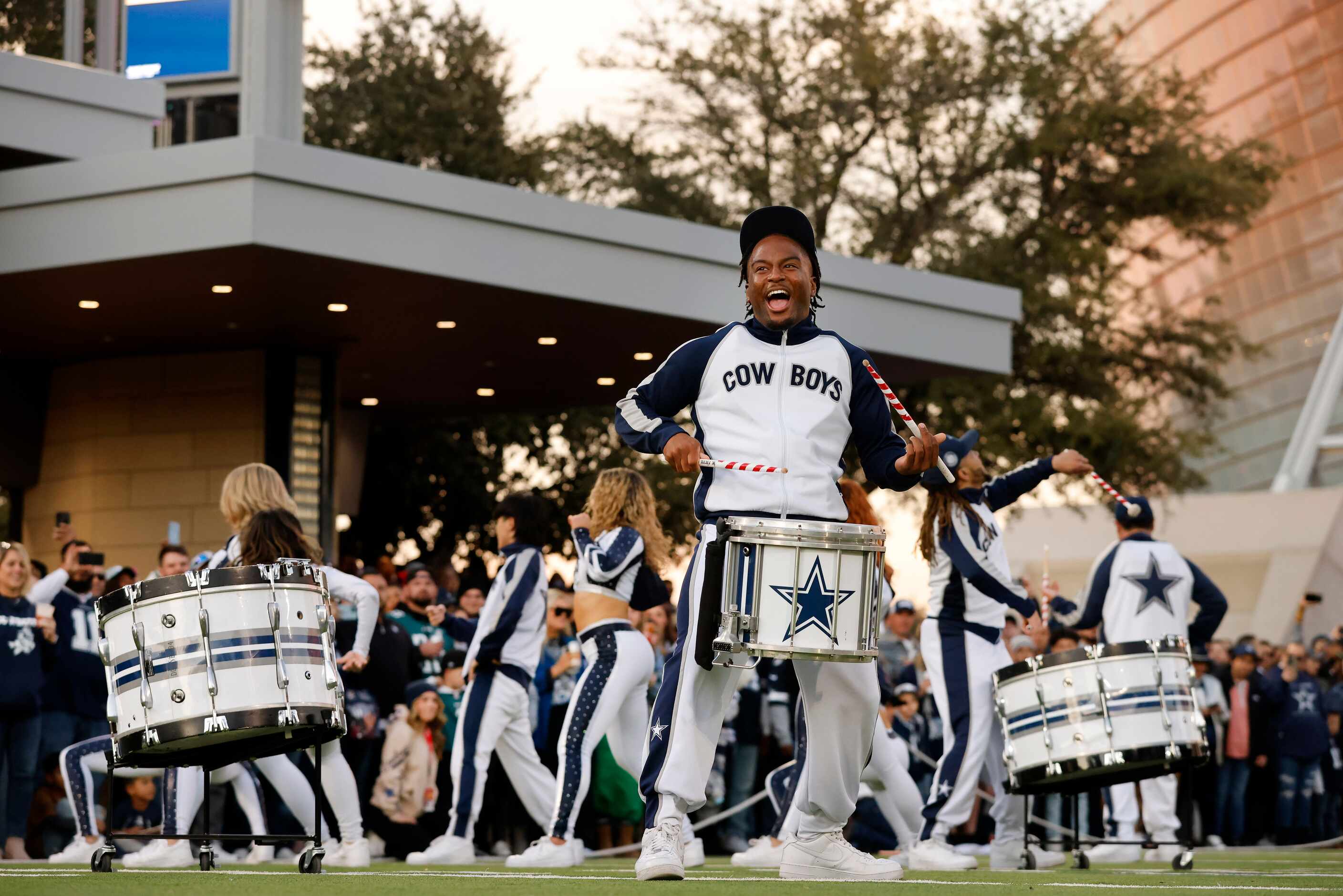 The Dallas Cowboys Rhythm & Blue drumlins and dance team perform on the West Plaza before...