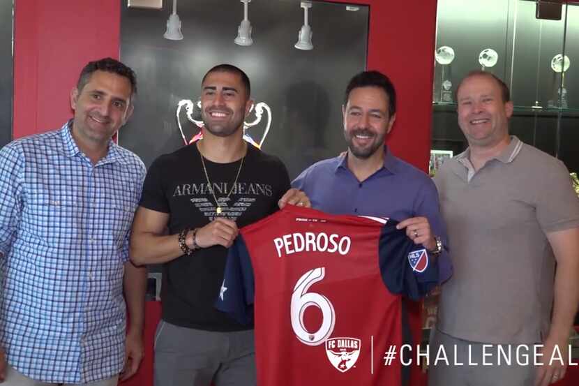 Marquinhos Pedroso signs with FC Dallas. Also pictured are Podroso's agent (left), FC Dallas...